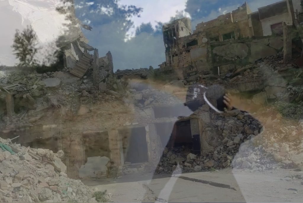 A veiled woman’s translucent figure overlays a bombed cityscape, capturing resilience and empowerment amid violent conflict.