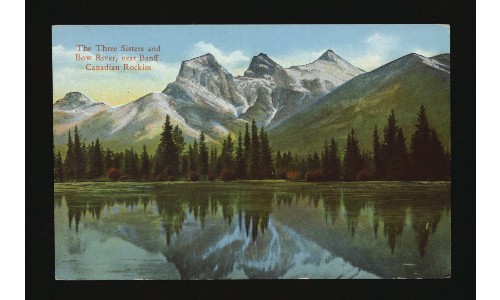The Three Sisters mountain peaks are visible behind the Bow River and a line of trees. Text in the top left reads 'The Three Sisters and Bow River, near Banff, Canadian Rockies.'
