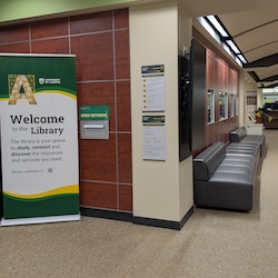 Cameron - in the library drop box